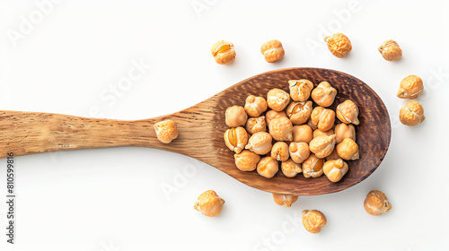 Spoon with dried chickpeas on white background