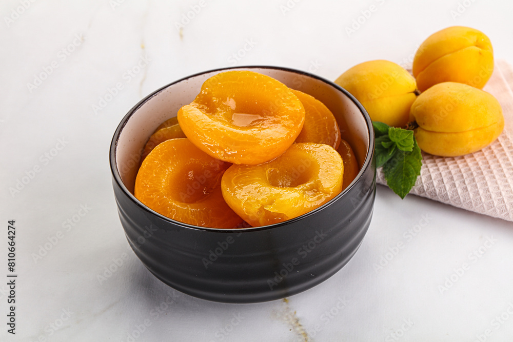 Few canned aprocots in the bowl Few canned aprocots in the bowl