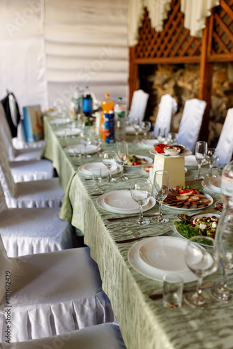Banquet hall, set table, beautiful dishes and food
