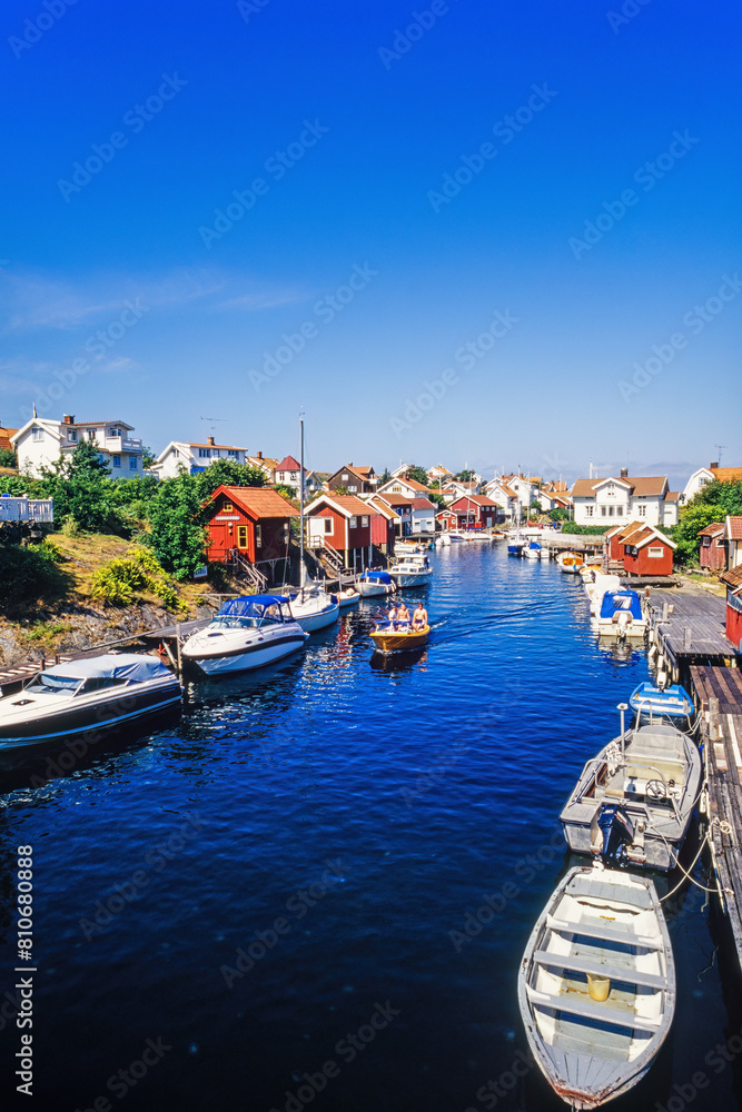 Φωτογραφία Boats in an canal in a idyllic swedish fishing village a sunny summer day