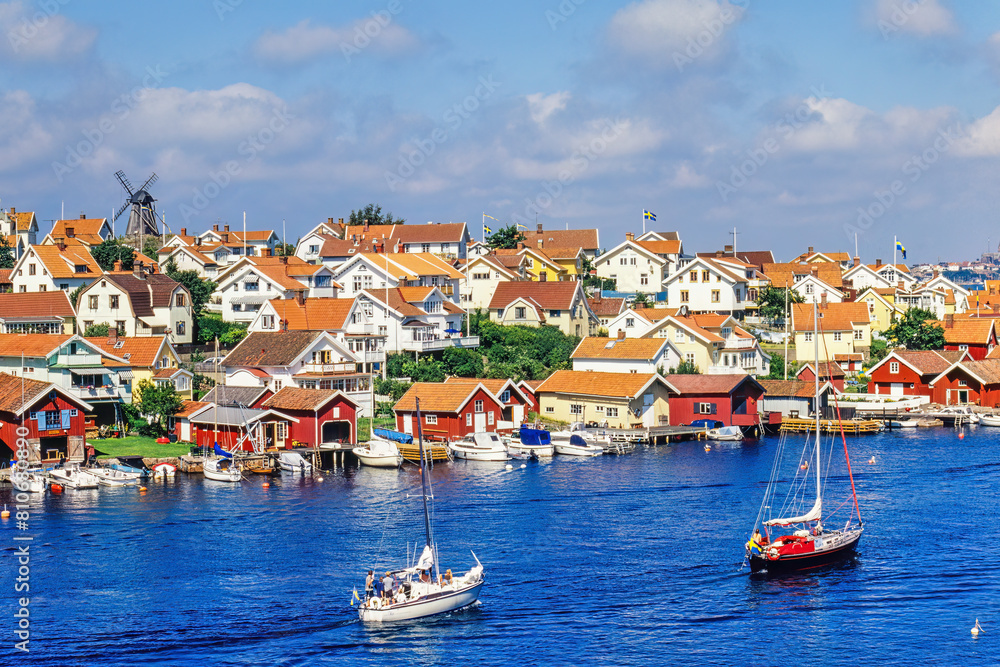 Boats on the sea by a swedish old fishing village