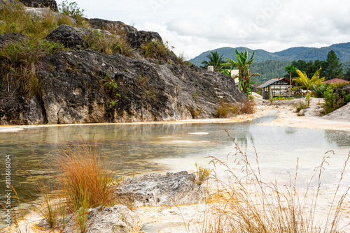 Sipoholon Hot Springs are hot springs in Tapanuli. This sulfur-containing bath was formed due to the eruption of Mount Martimbang photo