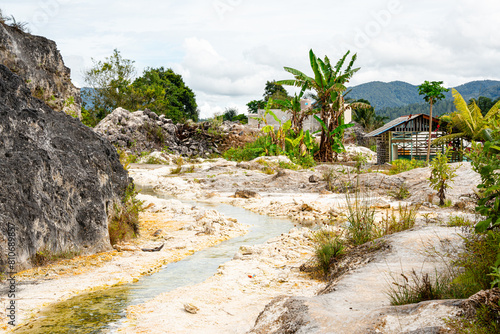 Sipoholon Hot Springs are hot springs in Tapanuli. This sulfur-containing bath was formed due to the eruption of Mount Martimbang photo