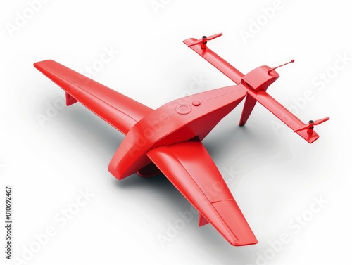 A red toy airplane with a propeller on it. photo