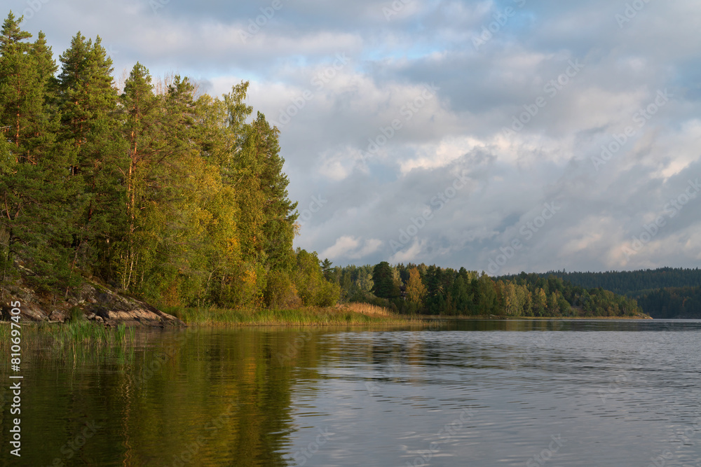 Lake Ladoga near the village Lumivaara on a sunny autumn day, Ladoga skerries, Lakhdenpokhya, Republic of Karelia, Russia Lake Ladoga near the village Lumivaara on a sunny autumn day, Ladoga skerries, Lakhdenpokhya, Republic of Karelia, Russia