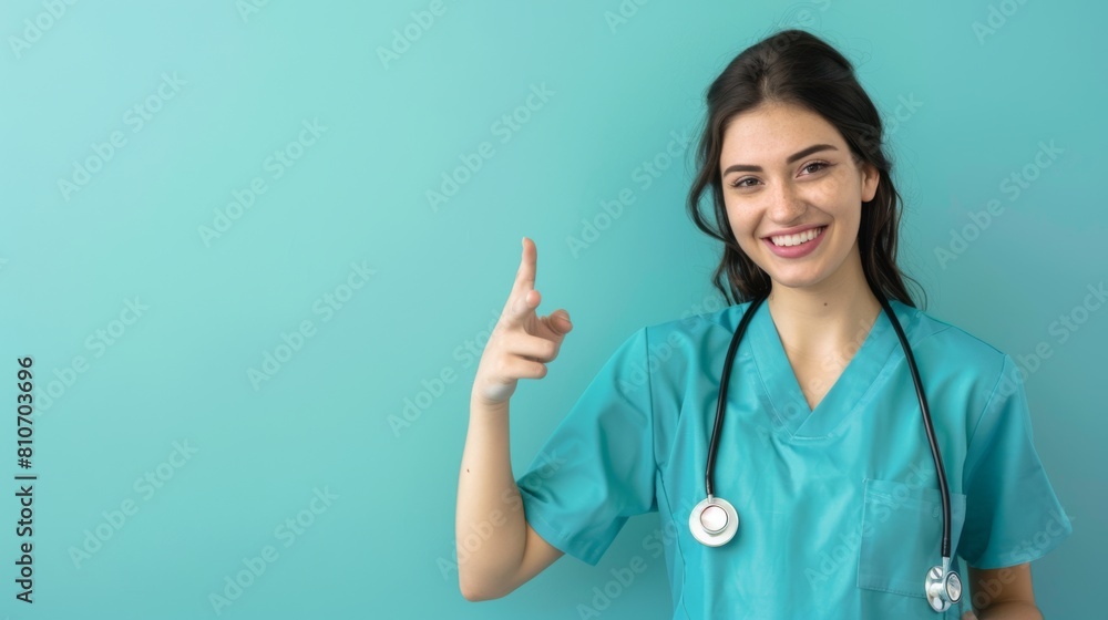 A Smiling Nurse Pointing Upward A Smiling Nurse Pointing Upward