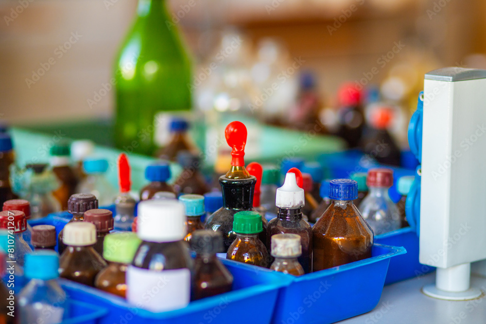 Flasks and test tubes with multi-colored chemical liquids in a laboratory in a clinic. Testing, analysis and research in laboratories. Clinical study.
Flasks and test tubes with multi-colored chemical liquids in a laboratory in a clinic. Testing, analysis and research in laboratories. Clinical study.