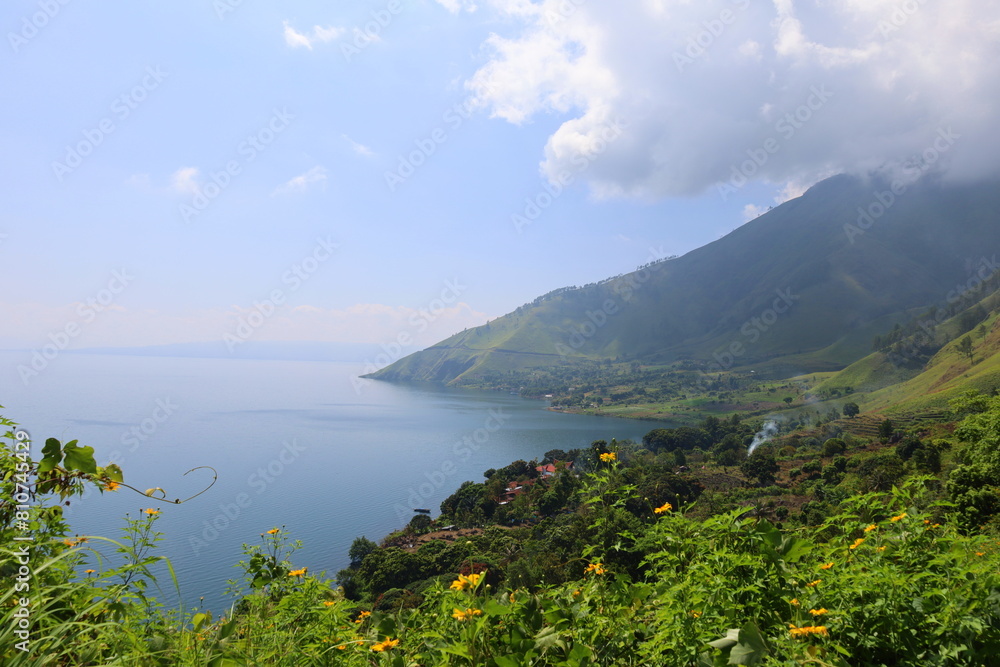 Stunning scenery of volcanic lake Toba - largest and deepest crater lake in the world located in North Sumatra, Indonesia