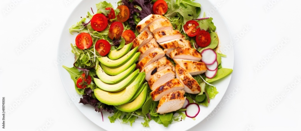 A healthy lunch featuring grilled chicken fillet and vegetable salad topped with avocado photographed from above with a white background The image provides empty space for text or other additions A healthy lunch featuring grilled chicken fillet and vegetable salad topped with avocado photographed from above with a white background The image provides empty space for text or other additions