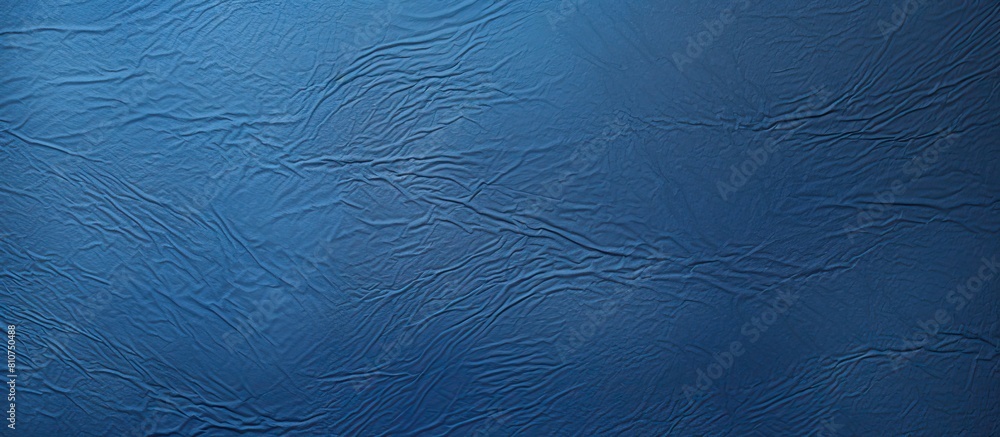 A background with a textured appearance resembling deep blue paper perfect for incorporating copy space image A background with a textured appearance resembling deep blue paper perfect for incorporating copy space image