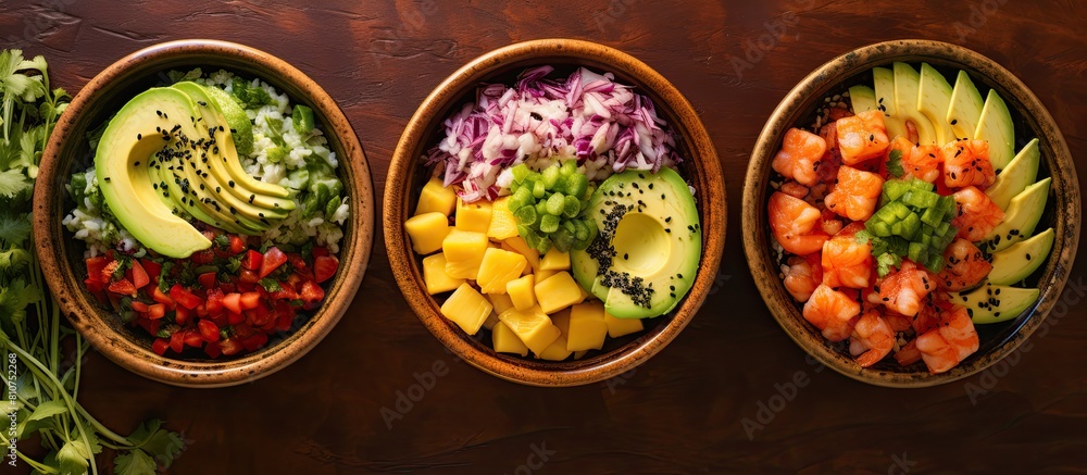 Top view copy space image of a traditional Hawaiian meal consisting of poke bowls filled with shrimp salmon avocado and mango Top view copy space image of a traditional Hawaiian meal consisting of poke bowls filled with shrimp salmon avocado and mango