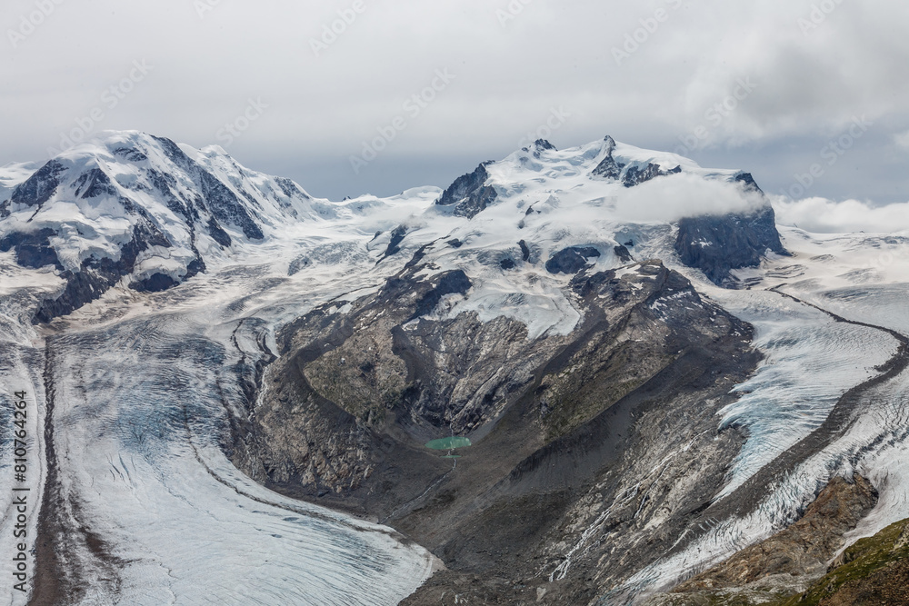 Panorama of cloud layer from mountain top over Swiss alps Panorama of cloud layer from mountain top over Swiss alps