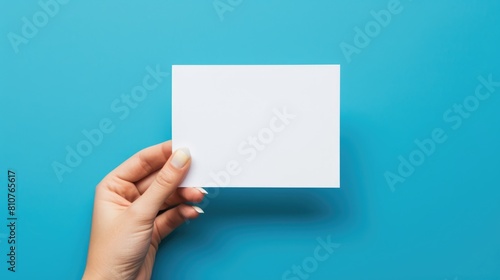 A Person Holding a Blank Card or Note