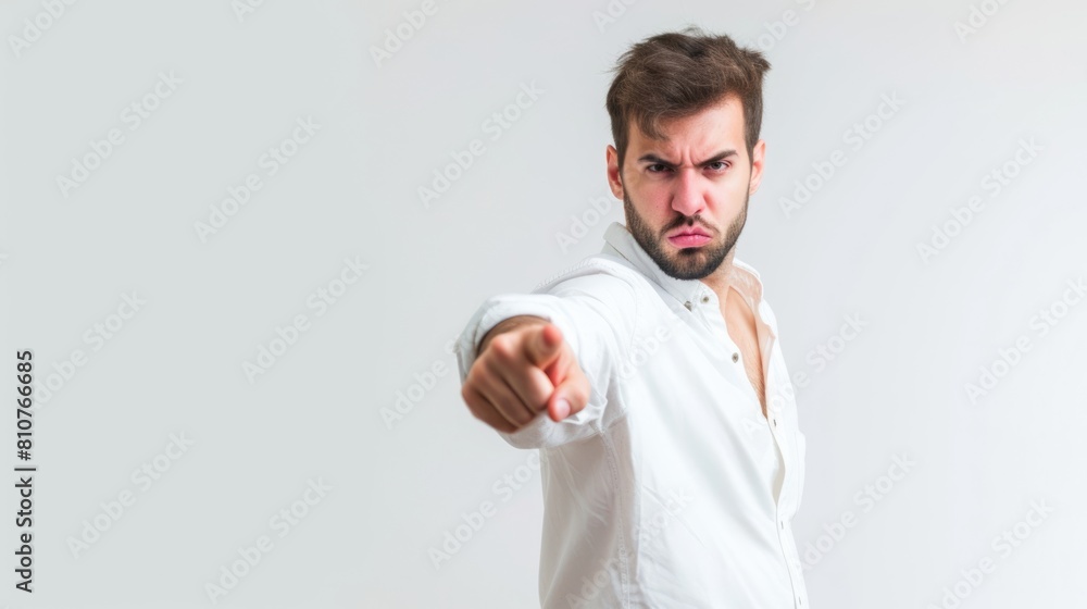 Angry Young Man Pointing Finger at You Fictional Character Created By Generative AI. Angry Young Man Pointing Finger at You Fictional Character Created By Generative AI.