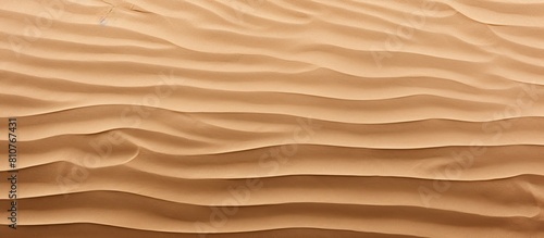 Closeup of sand texture with a horizontal beach pattern offering copy space for text