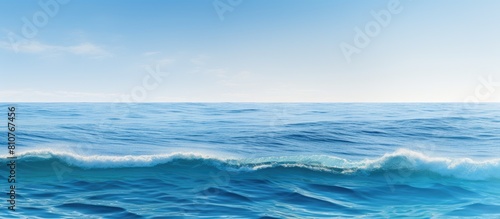 A serene expansive ocean with clear blue waves and a natural backdrop perfect for adding images or text. Creative banner. Copyspace image