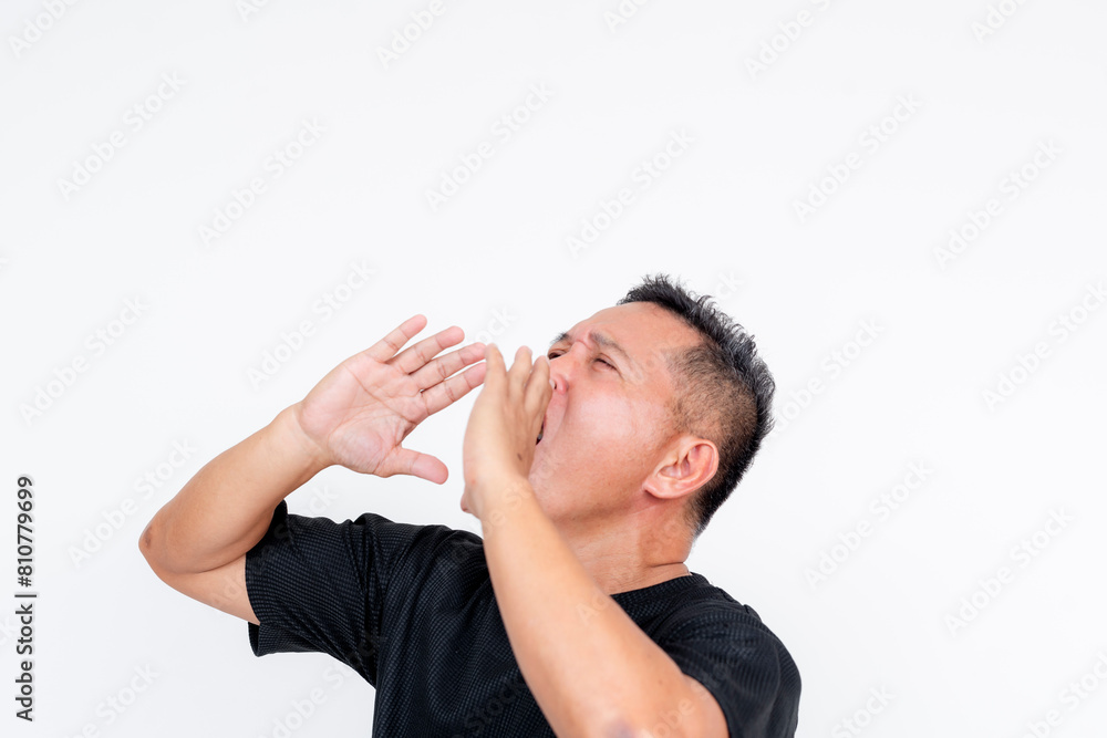 Middle aged Asian man hollering like Tarzan, isolated on white background Middle aged Asian man hollering like Tarzan, isolated on white background
