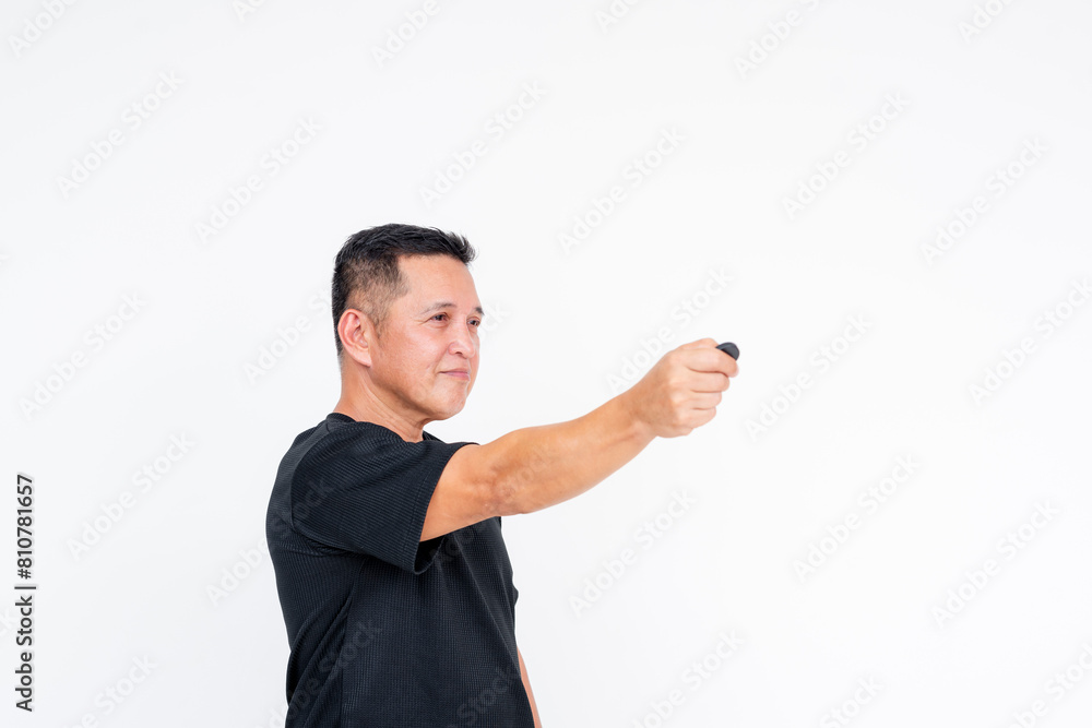 Middle aged Asian man using a key fob isolated on white background Middle aged Asian man using a key fob isolated on white background