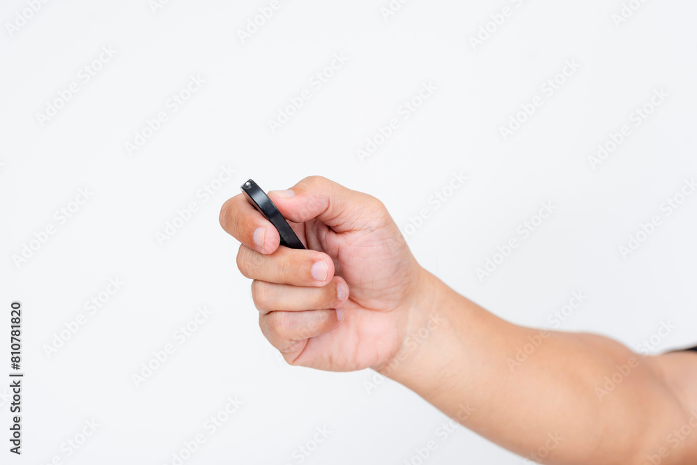 Middle-aged Asian man using a key fob isolated on white background Middle-aged Asian man using a key fob isolated on white background