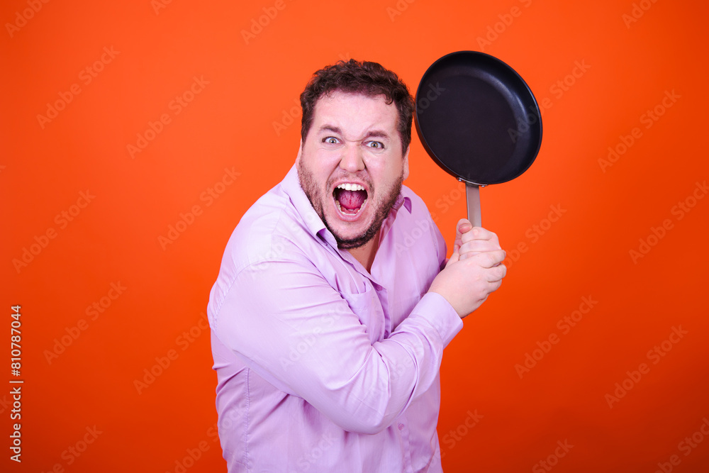 Joy, surprise and anger. Funny adult man posing in studio against orange background. Joy, surprise and anger. Funny adult man posing in studio against orange background.