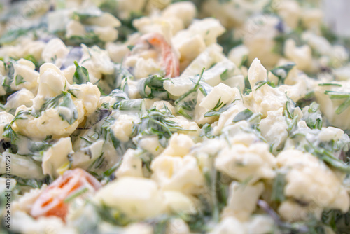 Cauliflower salad, lots of greens and other vegetables with sour cream