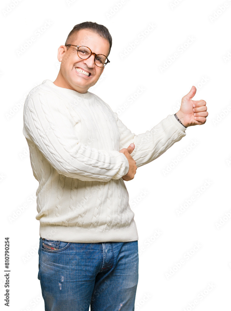 Middle age arab man wearing glasses over isolated background Looking proud, smiling doing thumbs up gesture to the side Middle age arab man wearing glasses over isolated background Looking proud, smiling doing thumbs up gesture to the side