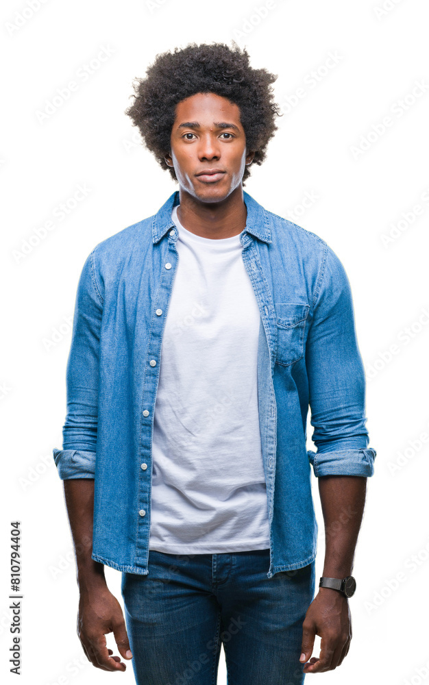 Afro american man over isolated background with serious expression on face. Simple and natural looking at the camera. Afro american man over isolated background with serious expression on face. Simple and natural looking at the camera.