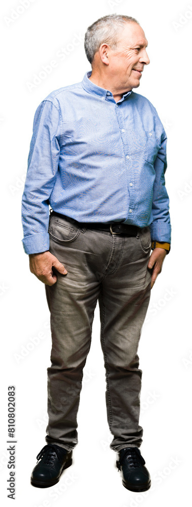 Obraz premium Handsome senior businesss man wearing elegant shirt looking away to side with smile on face, natural expression. Laughing confident.