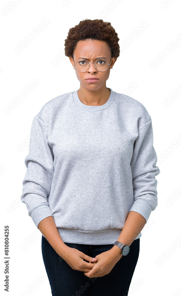 Young beautiful african american woman wearing glasses over isolated background skeptic and nervous, frowning upset because of problem. Negative person. Young beautiful african american woman wearing glasses over isolated background skeptic and nervous, frowning upset because of problem. Negative person.