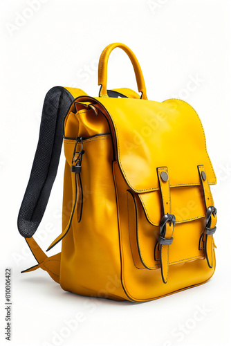 A yellow leather backpack with a black strap. The strap is attached to the backpack and is visible on the left side of the image