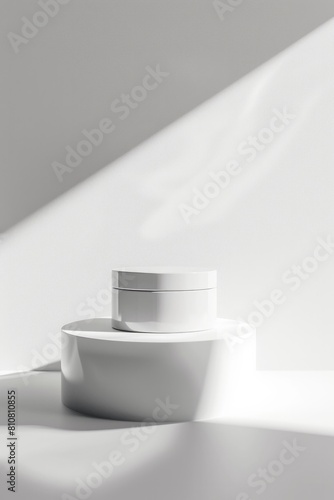 An exquisitely lit setup with a minimalist cosmetic jar on an elevated round platform casting soft shadows