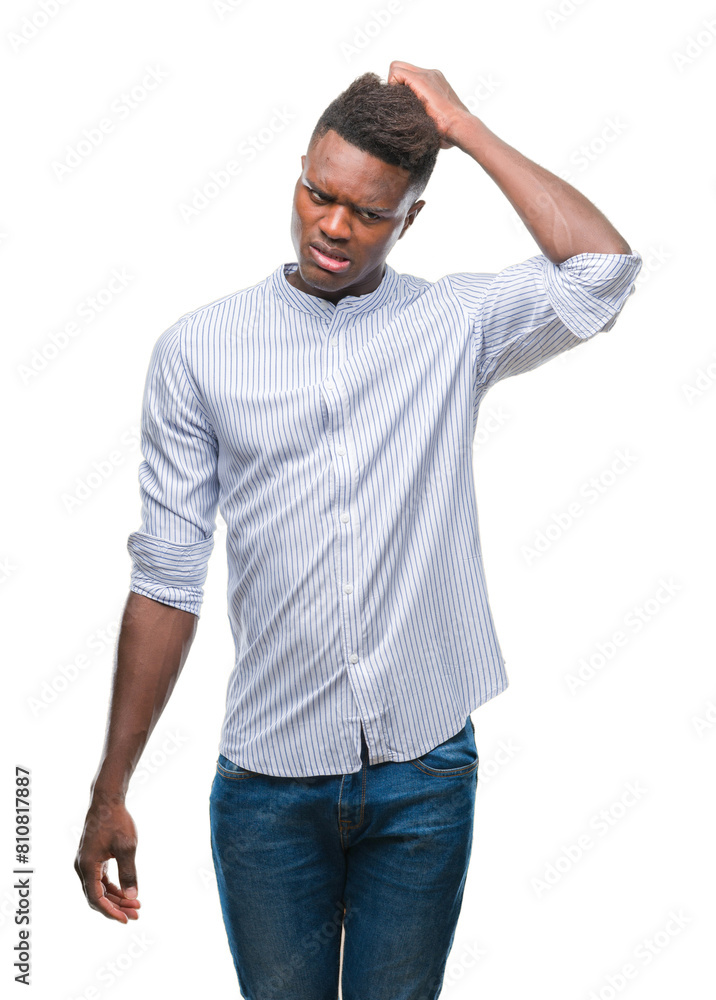 Young african american man over isolated background confuse and wonder about question. Uncertain with doubt, thinking with hand on head. Pensive concept. Young african american man over isolated background confuse and wonder about question. Uncertain with doubt, thinking with hand on head. Pensive concept.