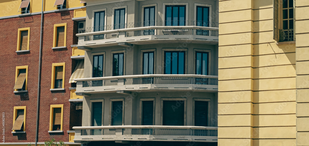 Neighboring buildings with different styles in Parma Neighboring buildings with different styles in Parma