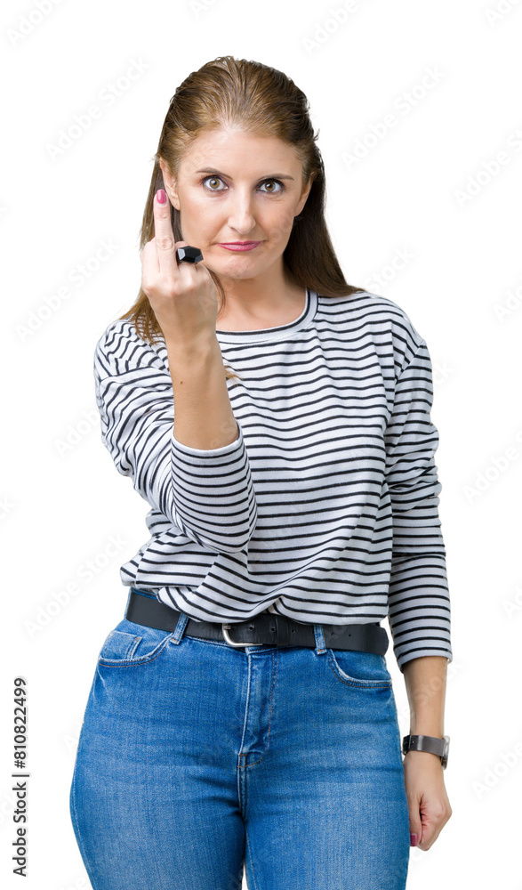 Middle age mature beautiful woman wearing stripes winter sweater over isolated background Showing middle finger, impolite and rude fuck off expression Middle age mature beautiful woman wearing stripes winter sweater over isolated background Showing middle finger, impolite and rude fuck off expression