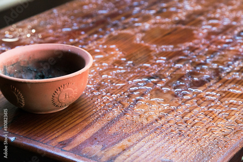 Clay Bowl and Wood Board after Rain
