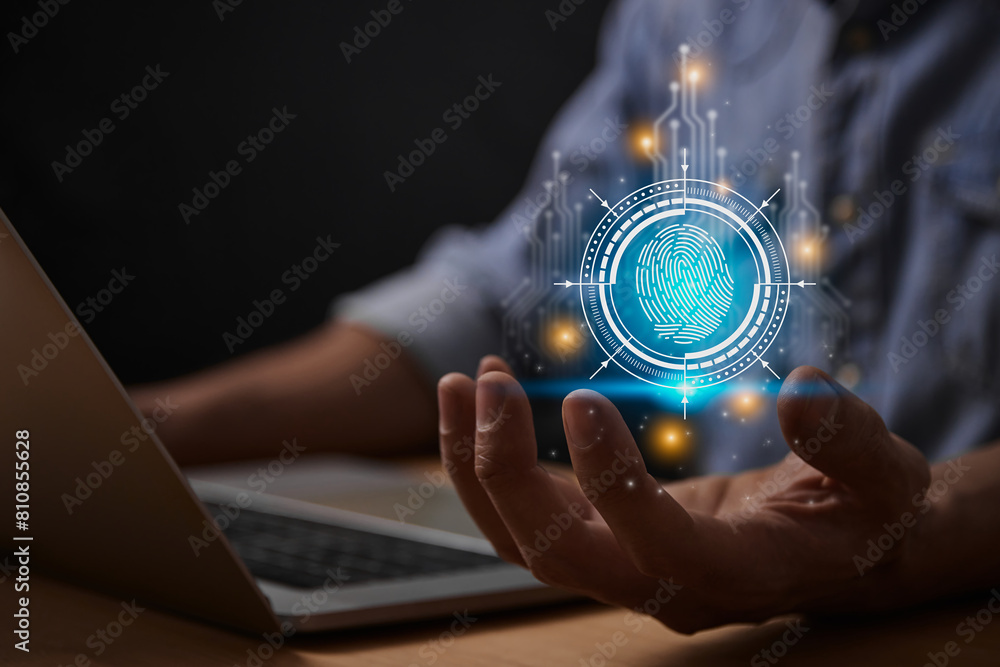 Blue Cyber Identity Data or Biometric Fingerprint Technology Concept and Internet Security Systems. Fingerprint in Cybersecurity HUD and Circuit Line with Laptop