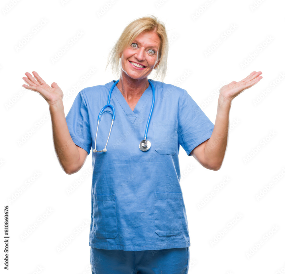 Middle age blonde nurse surgeon doctor woman over isolated background clueless and confused expression with arms and hands raised. Doubt concept. Middle age blonde nurse surgeon doctor woman over isolated background clueless and confused expression with arms and hands raised. Doubt concept.