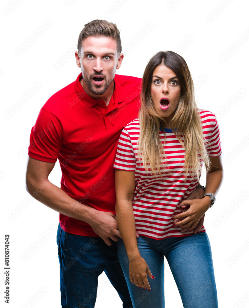 Young couple in love over isolated background afraid and shocked with surprise expression, fear and excited face. Young couple in love over isolated background afraid and shocked with surprise expression, fear and excited face.