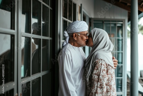 A Muslim couple shares a tender moment with a kiss Fictional Character Created By Generative AI.  © shelbys