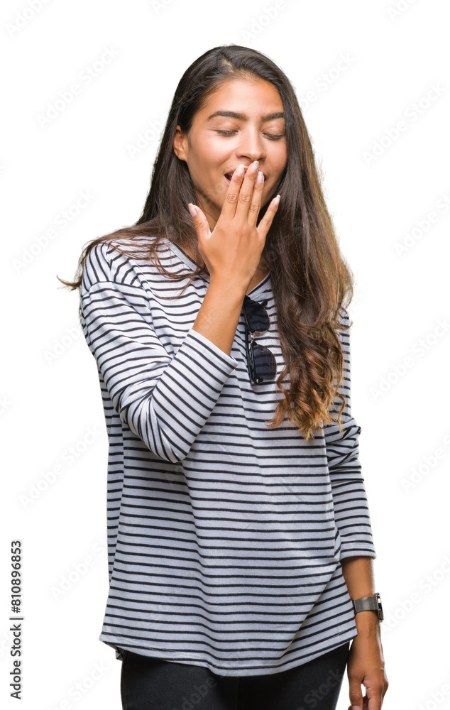 Fototapeta premium Young beautiful arab woman wearing sunglasses over isolated background bored yawning tired covering mouth with hand. Restless and sleepiness.