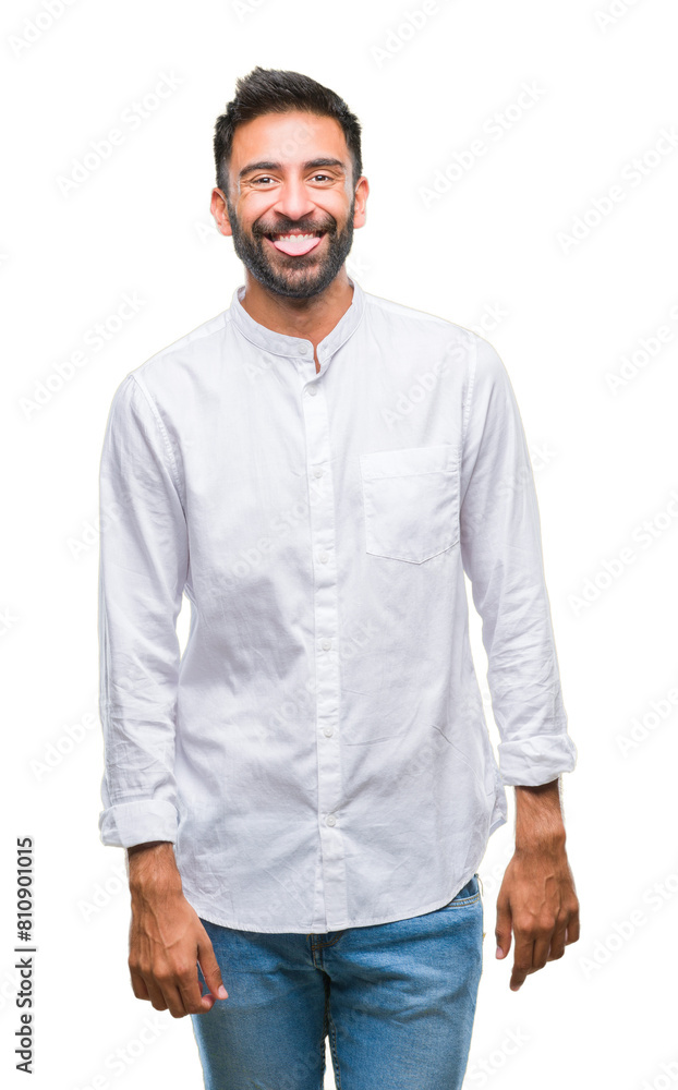 Fototapeta premium Adult hispanic man over isolated background sticking tongue out happy with funny expression. Emotion concept.