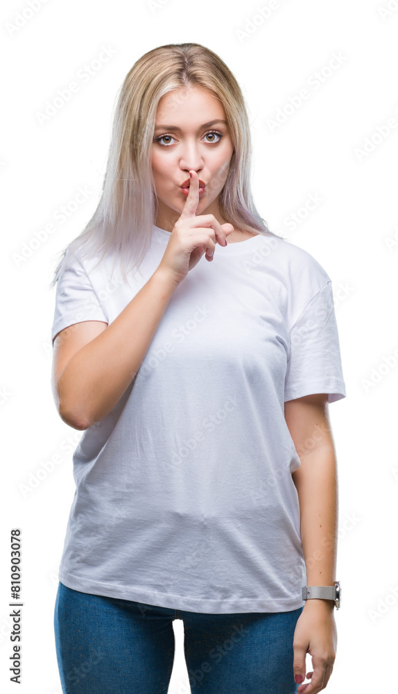Young blonde woman over isolated background asking to be quiet with finger on lips. Silence and secret concept. Young blonde woman over isolated background asking to be quiet with finger on lips. Silence and secret concept.