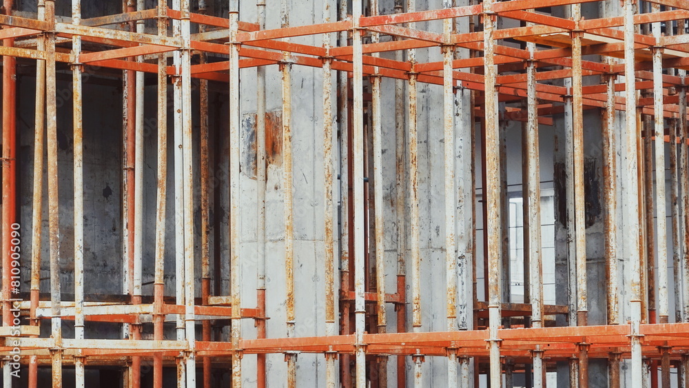 Rusty Metal Scaffolding On Concrete Building Construction Rusty Metal Scaffolding On Concrete Building Construction