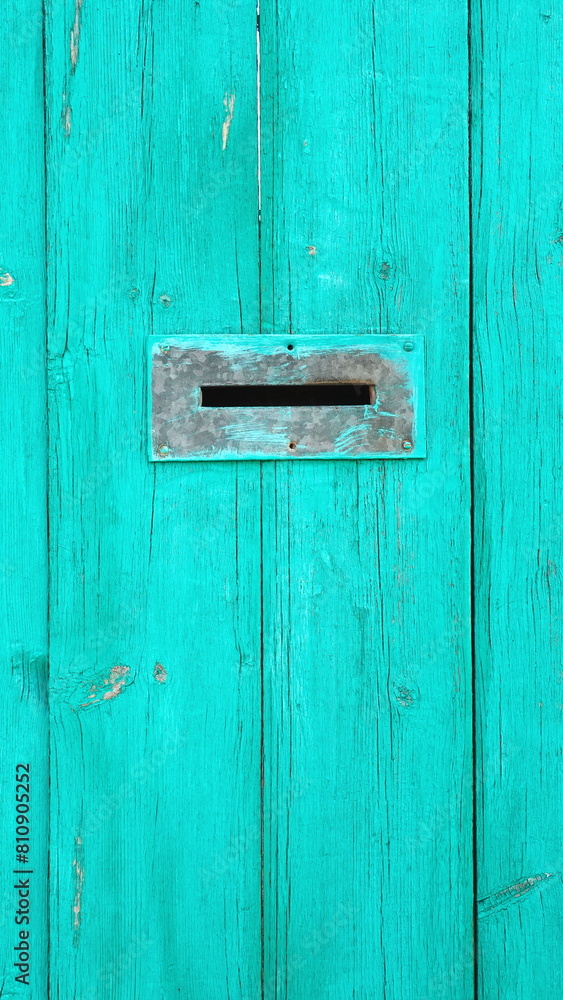 Vibrant Turquoise Painted Wooden Door Texture Close-Up Vibrant Turquoise Painted Wooden Door Texture Close-Up