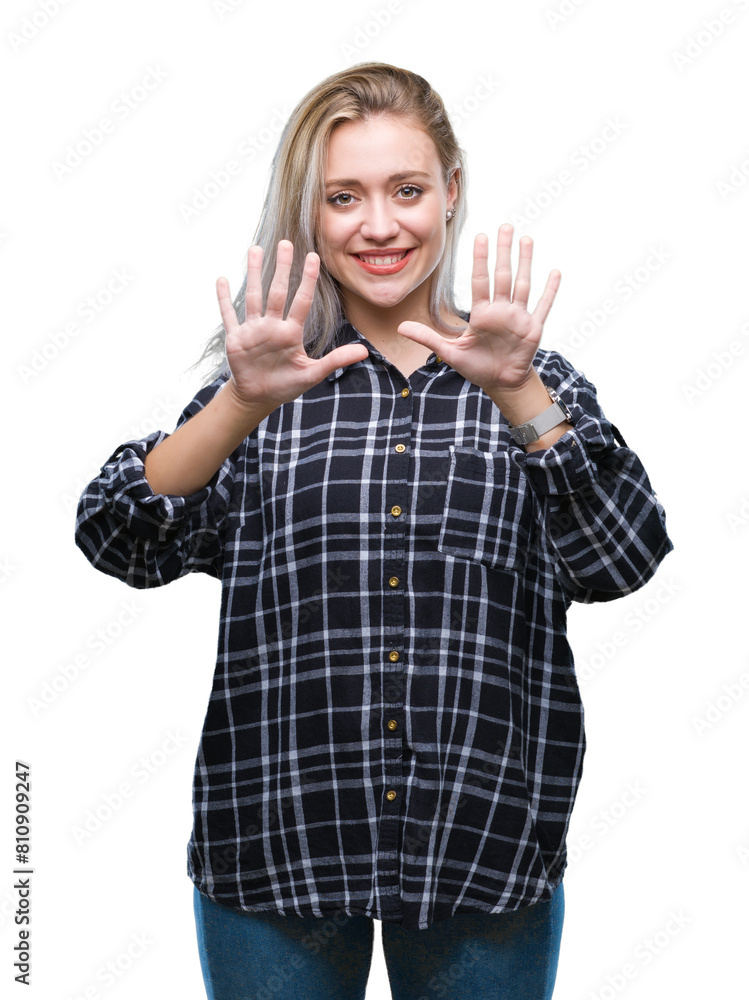 Obraz premium Young blonde woman over isolated background showing and pointing up with fingers number ten while smiling confident and happy.
