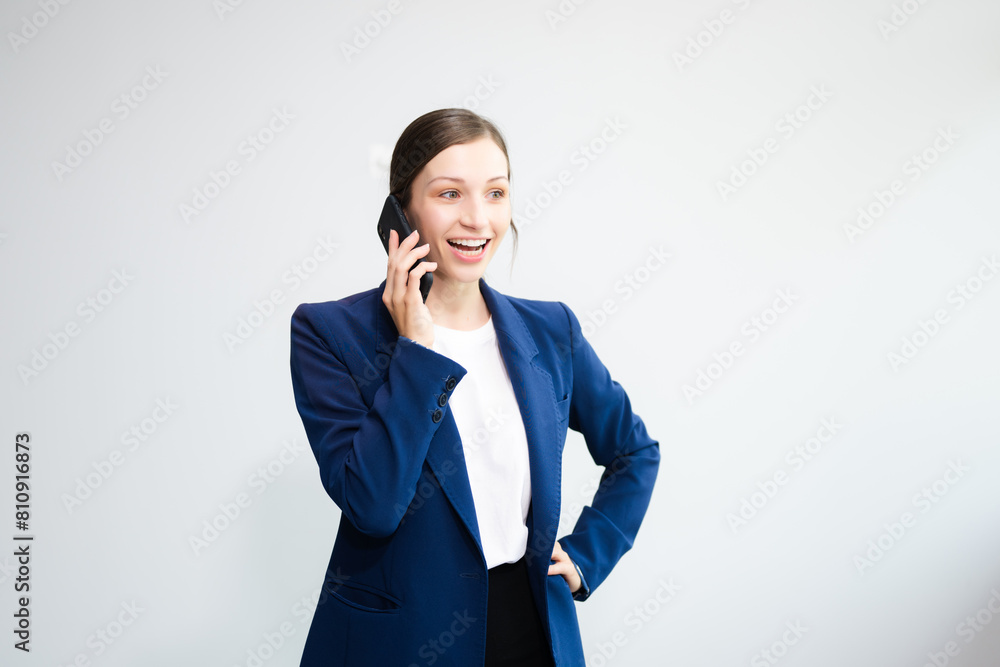 Confident Caucasian businesswoman CEO idea holding tablet and laptop for remote work, online viewing, multitasking isolated Confident Caucasian businesswoman CEO idea holding tablet and laptop for remote work, online viewing, multitasking isolated