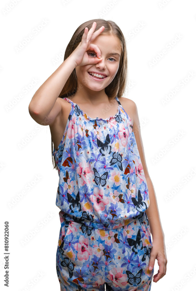 Young beautiful girl wearing colorful dress over isolated background doing ok gesture with hand smiling, eye looking through fingers with happy face. Young beautiful girl wearing colorful dress over isolated background doing ok gesture with hand smiling, eye looking through fingers with happy face.