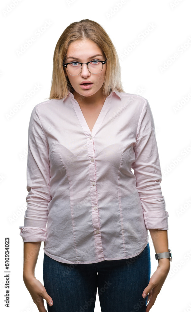 Young caucasian business woman wearing glasses over isolated background afraid and shocked with surprise expression, fear and excited face. Young caucasian business woman wearing glasses over isolated background afraid and shocked with surprise expression, fear and excited face.