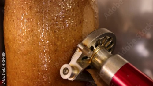 Doner meat being sliced in slow motion