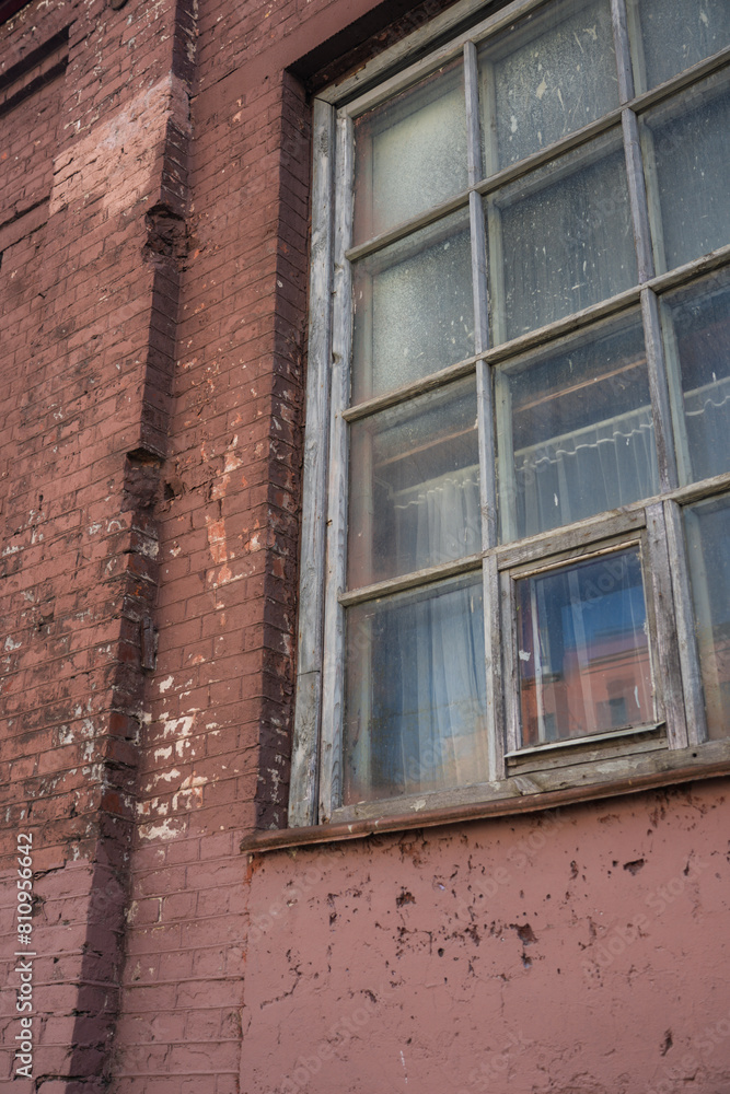 The window of an old, abandoned factory